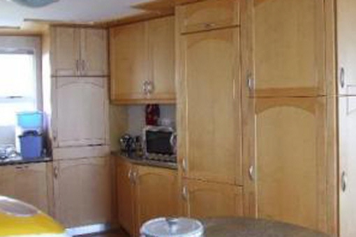 Part of the kitchen with cupboards